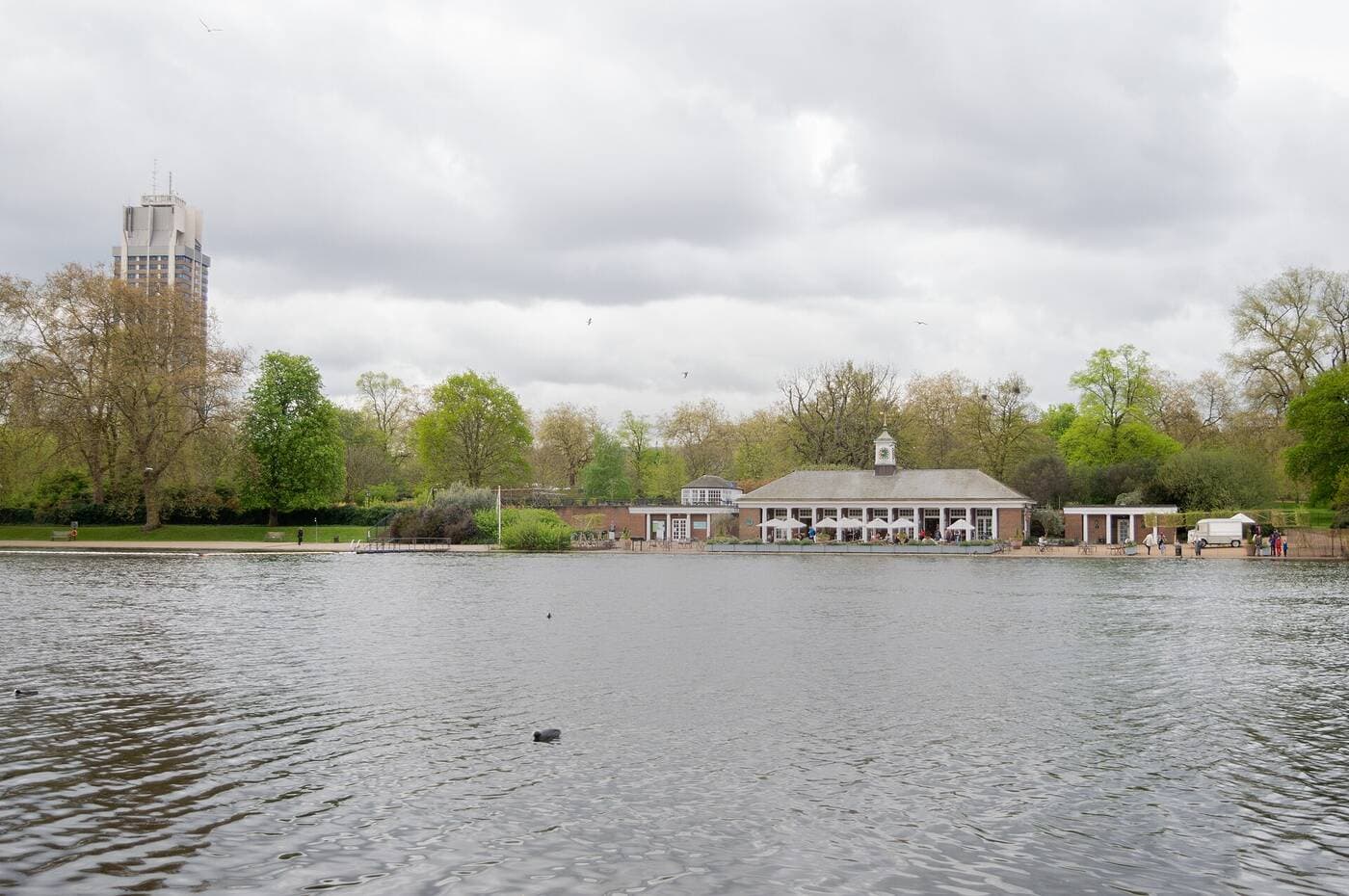 The Serpentine lake in Hyde Park, with trees along the shore